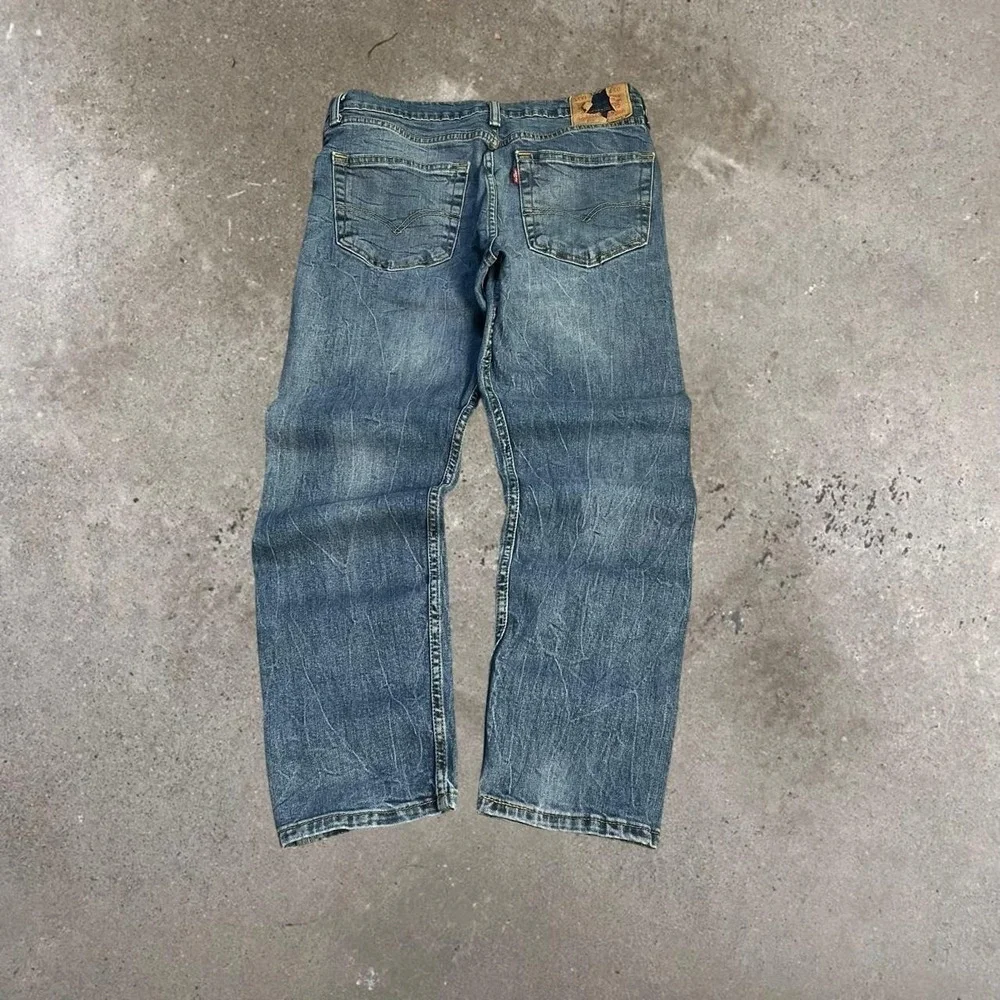 Levi's 502 Mid Wash Faded Denim Jeans